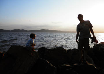 Father and Son on the Rocks. © 2015 Peter Wetzel.