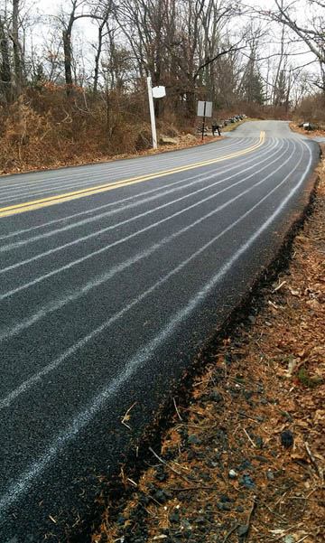 Brined roadway prior to winter storm © 2017 Peter Wetzel.