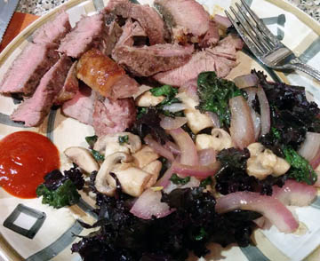 London Broil with sauteed purple kale, onion, and mushrooms. © 2017 Peter Wetzel.