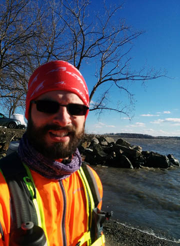 Grimace. Or a smile. Or, something. It was in the 20s with wind gusts along the river that probably topped 40mph. So it was probably a grimace. © 2017 Peter Wetzel.